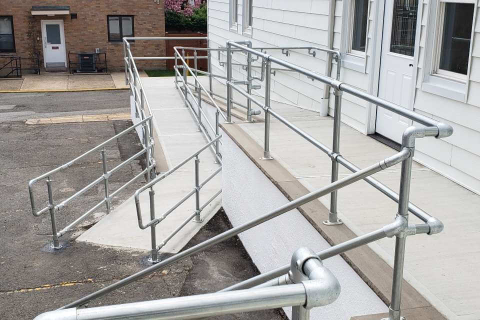 concrete ada ramp with handrail Tulsa